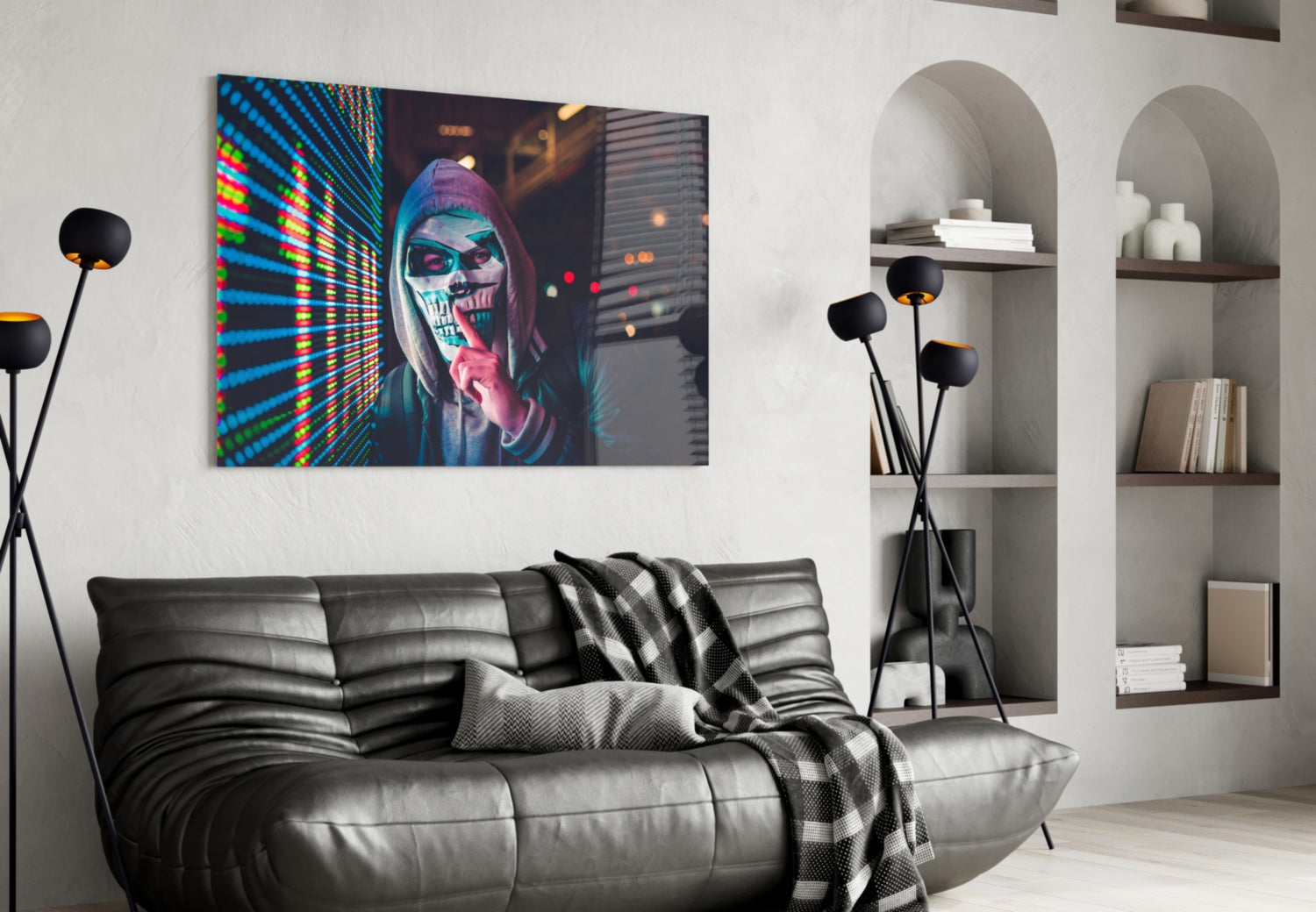 Neon cyberpunk skull portrait glass art displayed above black leather sofa in modern living room setting.