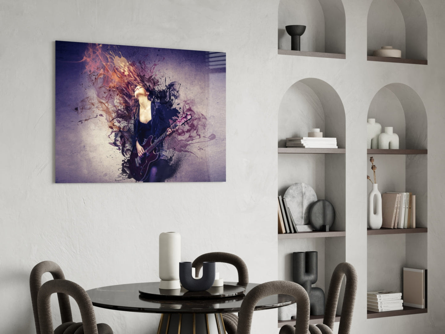 Purple and gold abstract guitar player canvas art hanging above a black round dining table in a modern interior setting.