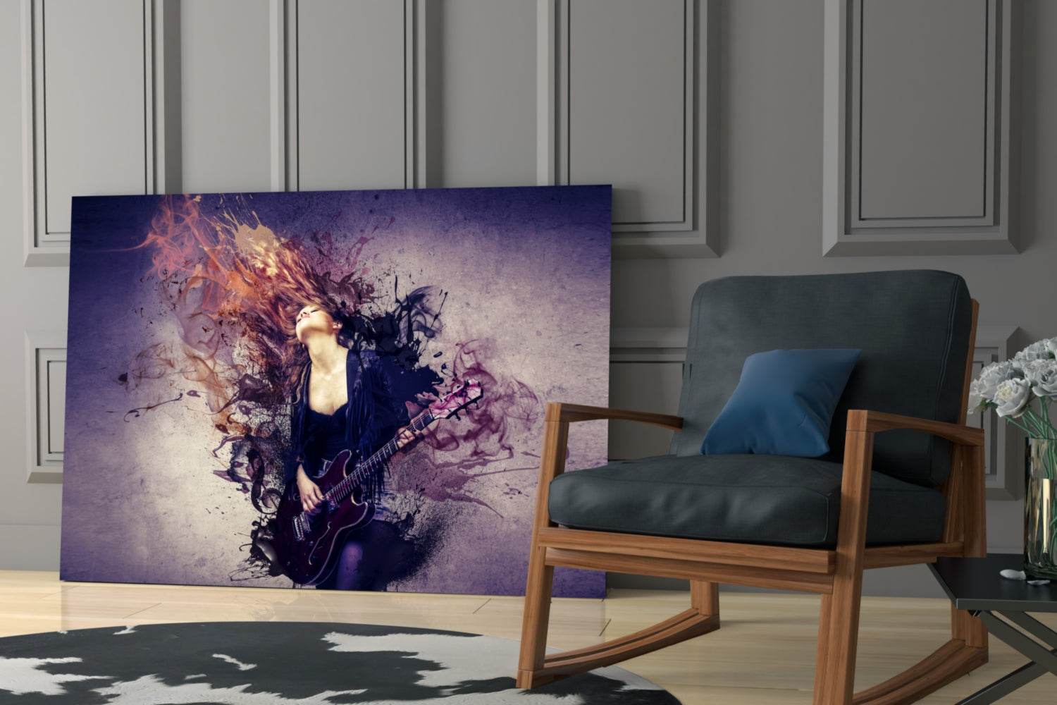 Rock Glass Wall Art displaying a female guitarist with purple and orange explosive effects, displayed in a modern living room next to a wooden chair.
