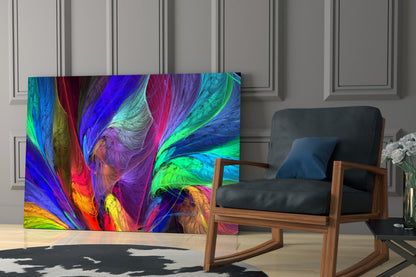 Vibrant multicolored glass wall art panel with swirling blue, purple, green, and yellow patterns displayed in modern living room setting.