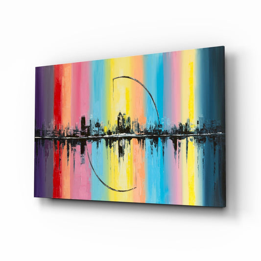 Angled perspective view of a glass wall art panel featuring a colorful rainbow striped background with a city skyline and arch reflected below.