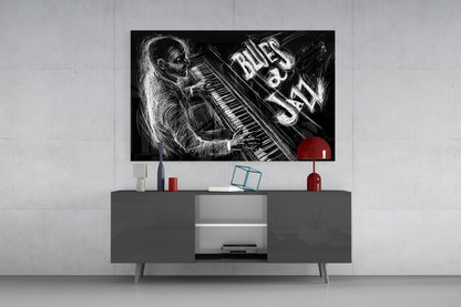 Black and white jazz blues glass wall art mounted above gray media console, featuring illustrated monkey at piano with "BLUES & JAZZ" text and red accent circle.
