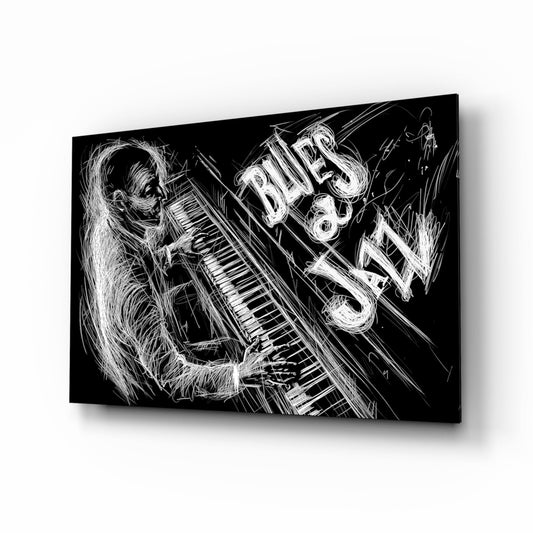 Black and white sketch-style glass wall art showing a figure playing keyboard with "BLUES JAZZ" text, displayed at an angled perspective.