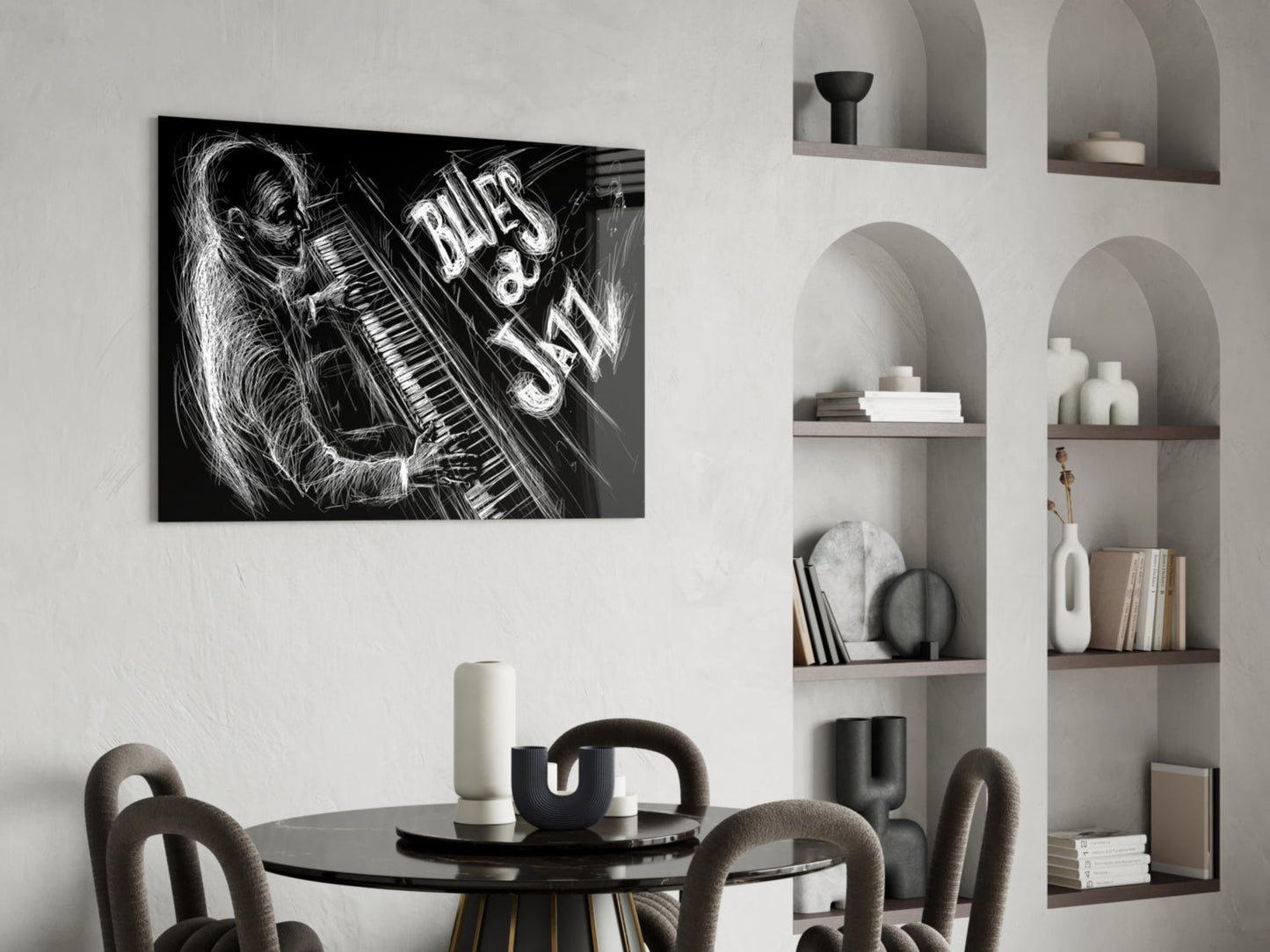 Black and white glass wall art depicting a musician playing keyboard with "BLUES JAZZ" text, displayed above a round dining table in a modern interior.