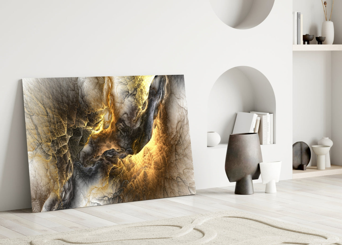 Golden Chaos Glass Wall Art leaning against white wall in minimalist room with sculptural vessels and built-in shelving.