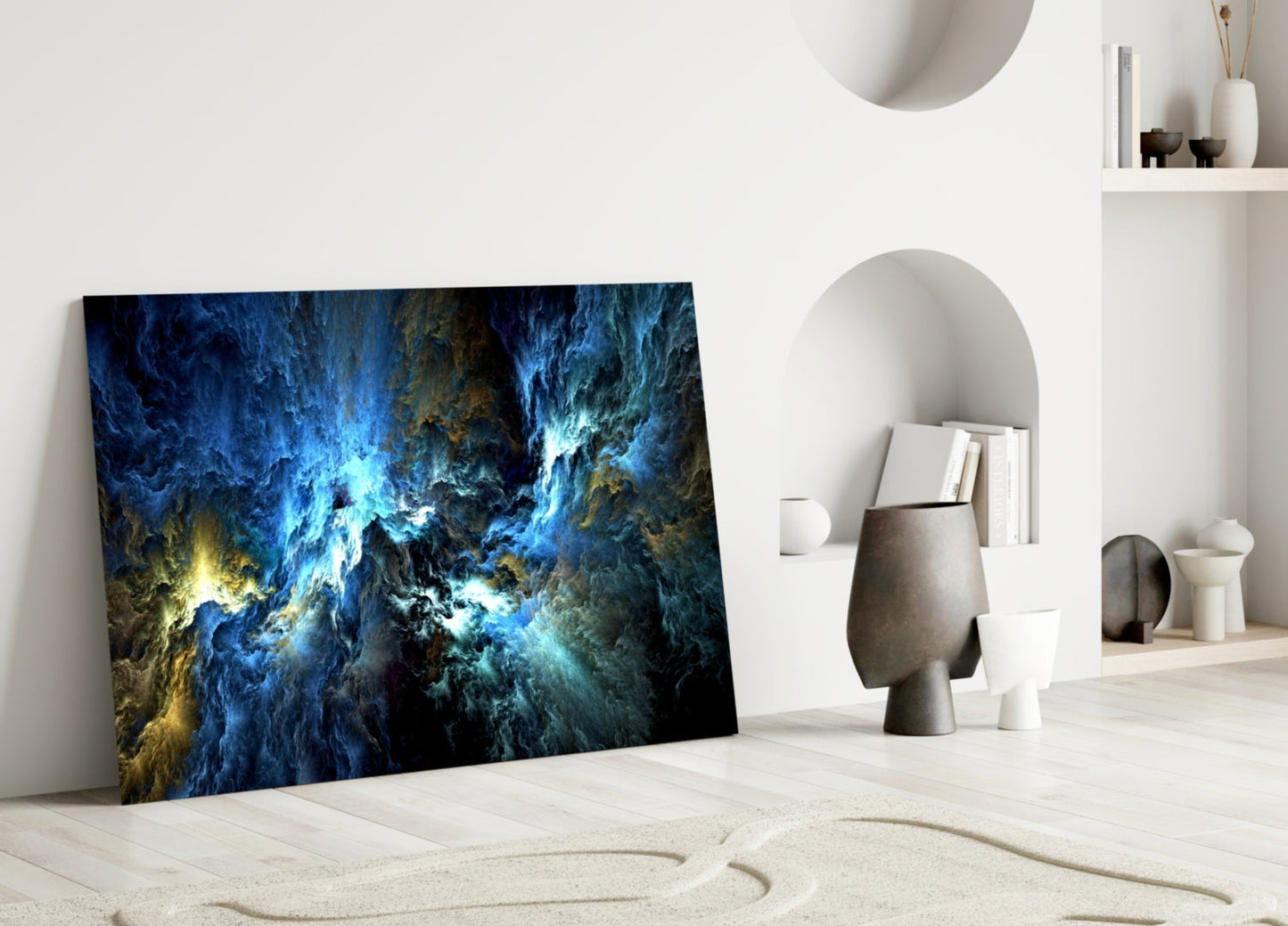 Cosmic Blue Glass Wall Art leaning against white wall in minimalist interior with decorative objects and shelving.