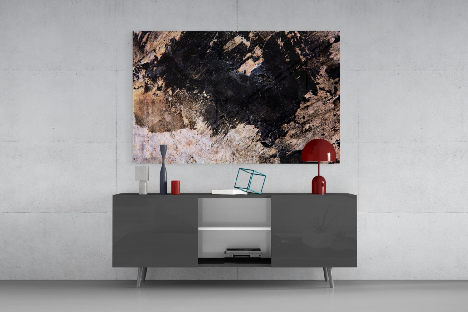 Modern living room setup with abstract textured glass art featuring black, tan, and white tones displayed above gray media console with red decorative accessories.