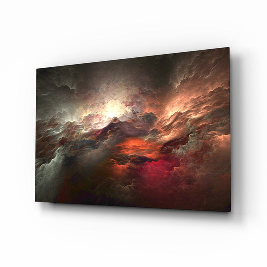 Red Chaos Glass Wall Art displayed at an angle showing dramatic red and orange light breaking through turbulent dark clouds on a glossy glass surface.