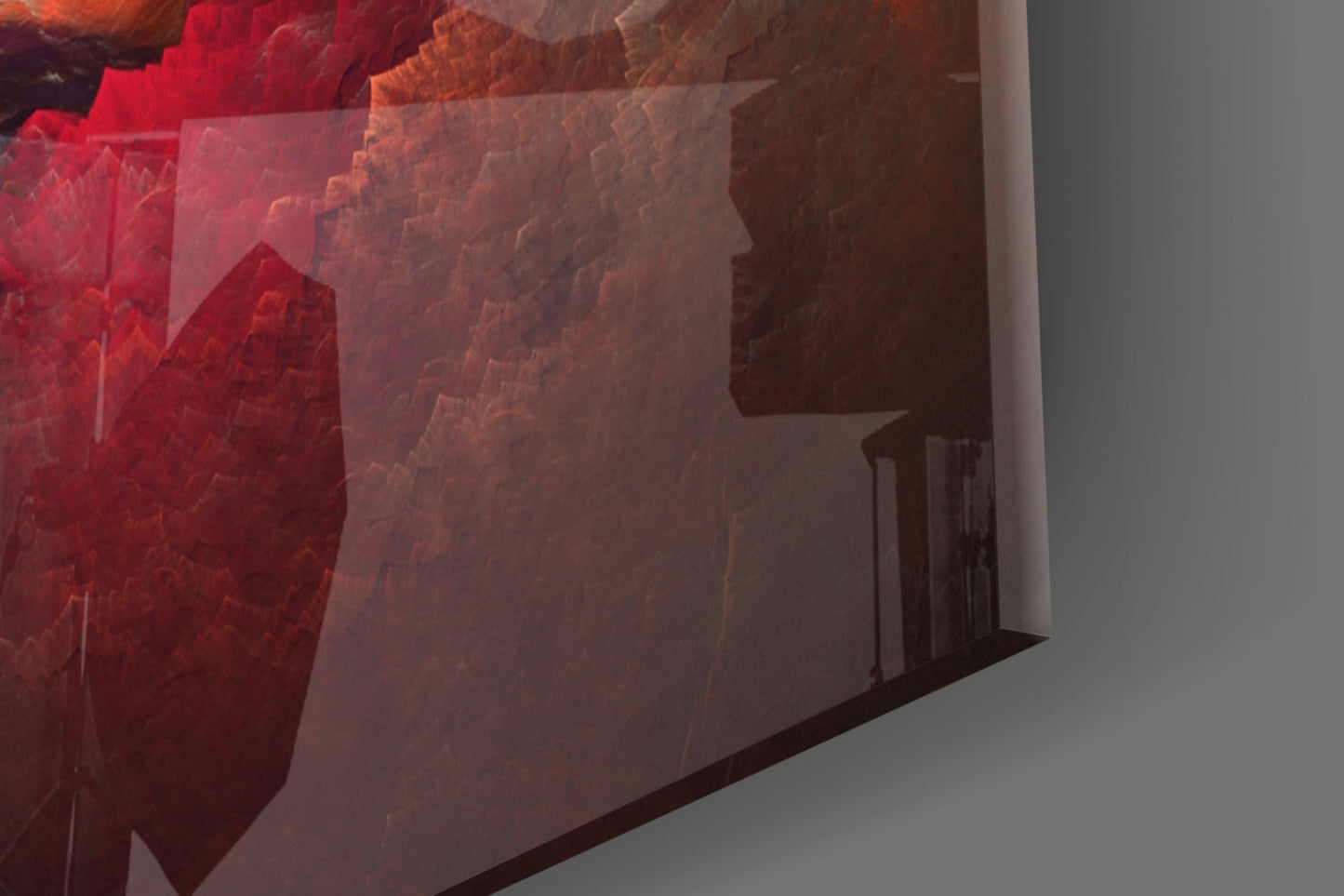 Red Chaos Glass Wall Art installed on white wall, showing layered red and orange translucent glass panels with architectural silhouette detail.