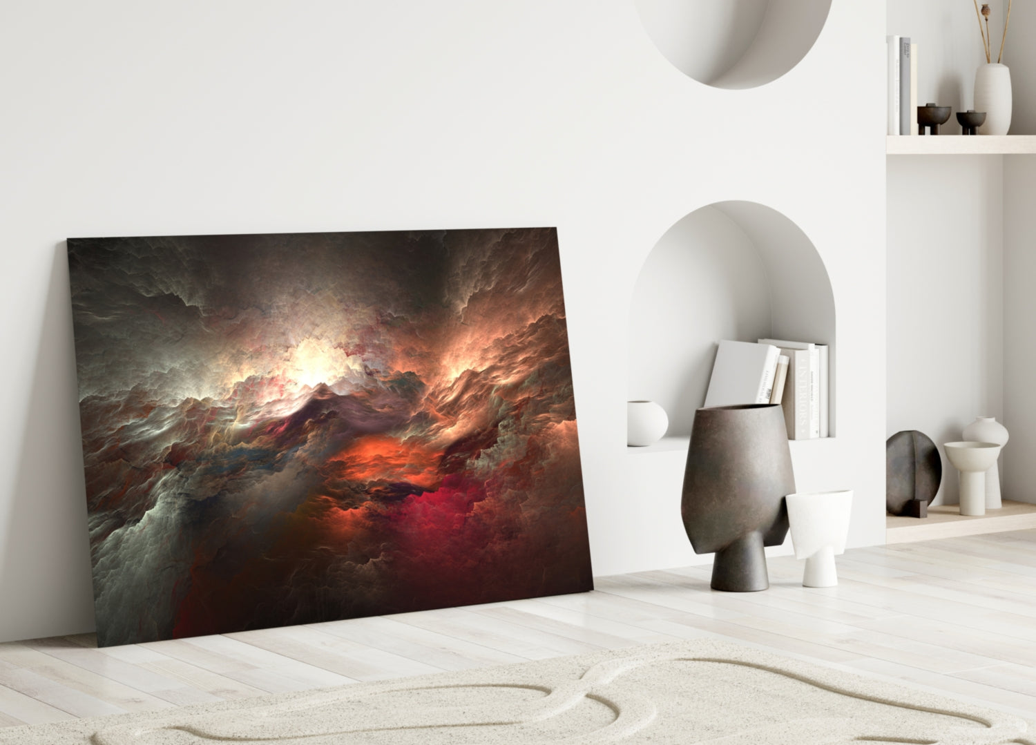 Red Chaos Glass Wall Art leaning against white wall in minimalist interior with sand texture floor and ceramic decorative objects.