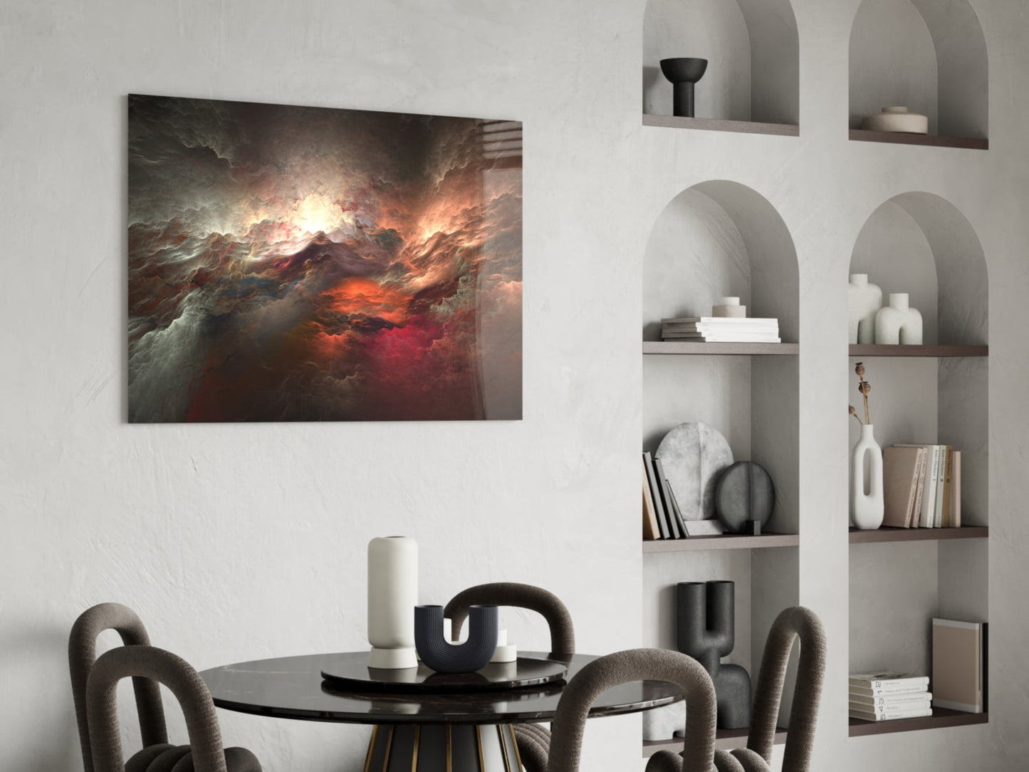 Red Chaos glass wall art displaying dramatic orange and red cloudy sky hung above black dining table in modern interior with arched shelving.