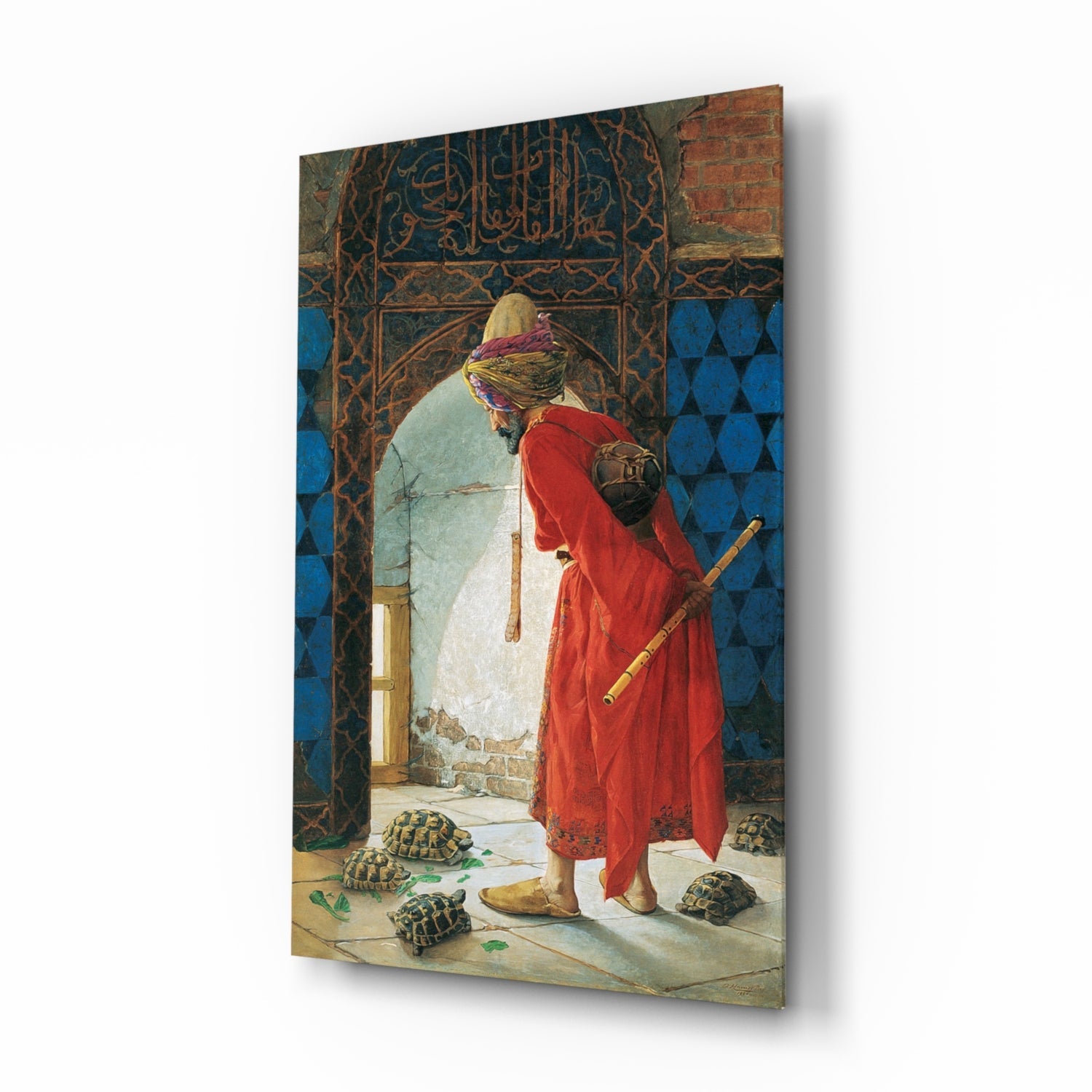 Glass wall art depicting a figure in red robes training tortoises in an ornate Islamic interior setting, displayed at an angle.