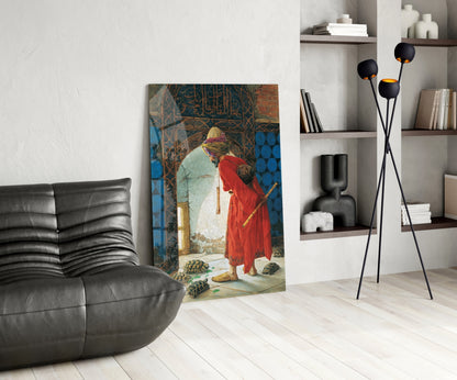 Turtle Trainer glass wall art leaning against white wall in modern living room with black leather sofa and shelving.