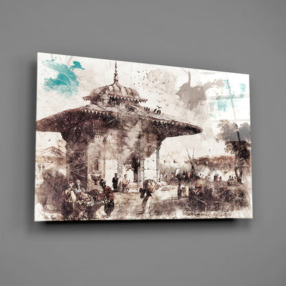 Glass wall art featuring a sepia-toned historical illustration of an Ottoman mosque with dome and minaret, surrounded by figures and turquoise watercolor accents.