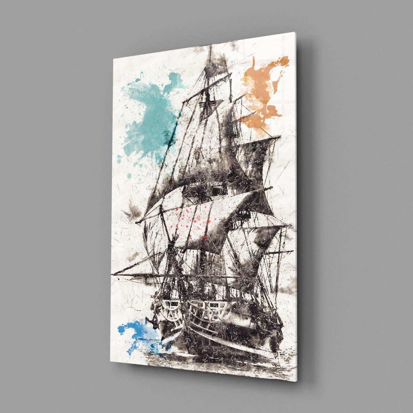 Angled view of glass wall art featuring a detailed sailing ship with watercolor splashes in teal, orange, and blue against a cream background.