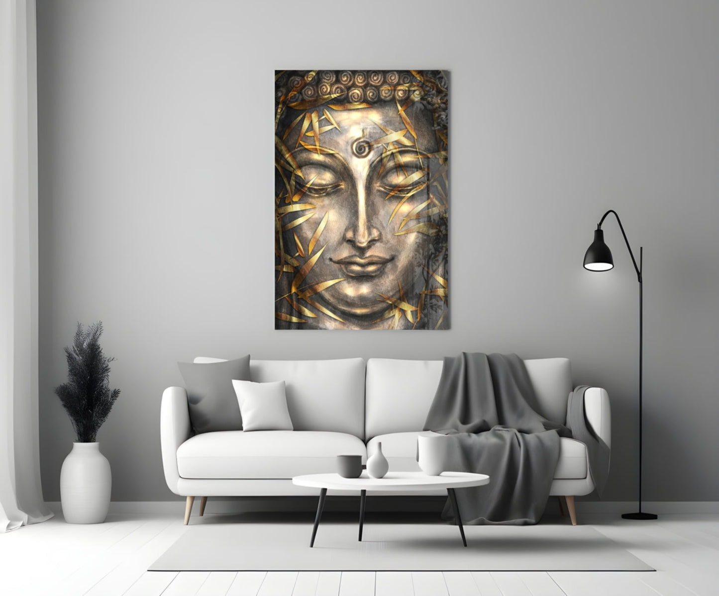 Mystical Sculpture Glass Wall Art with golden leaf details on serene face displayed above white sofa in minimalist living room interior.