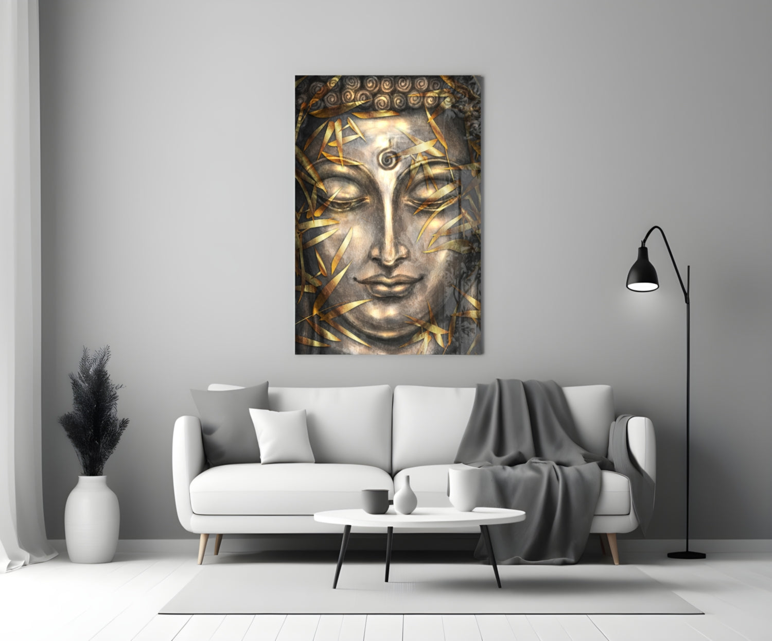 Mystical Sculpture Glass Wall Art with golden leaf details on serene face displayed above white sofa in minimalist living room interior.