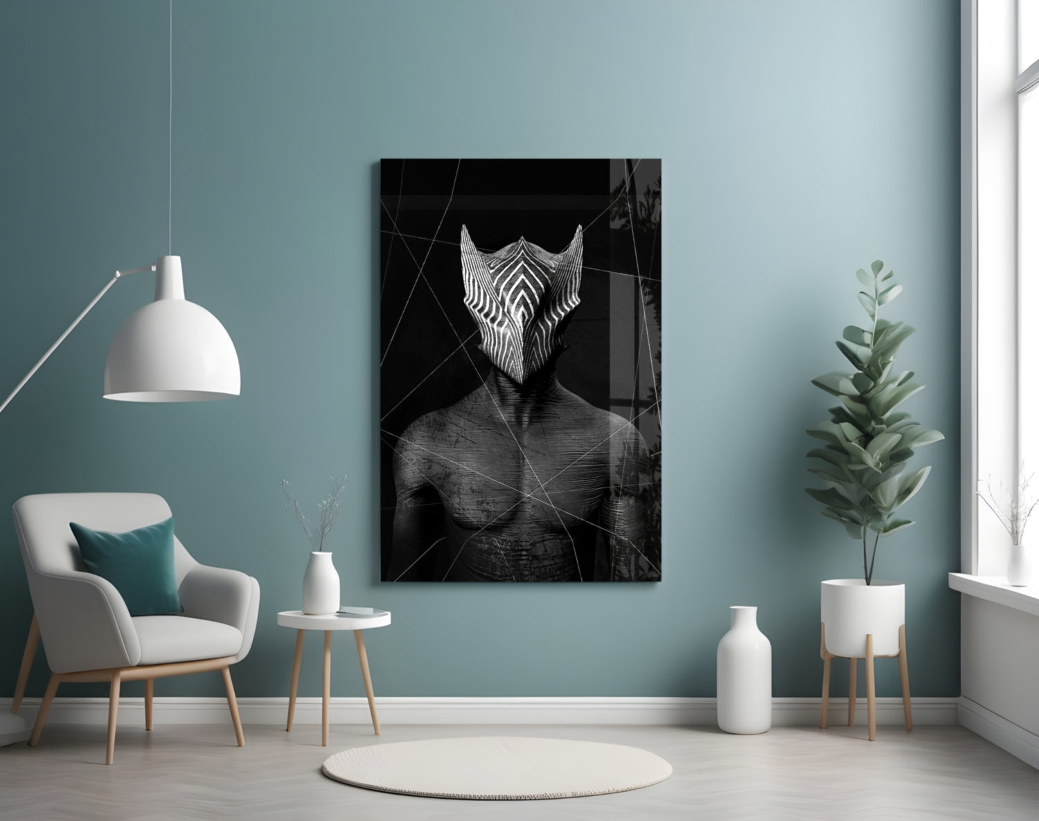 Black and white glass wall art depicting an abstract figure with geometric patterned wings displayed in modern turquoise room setting.