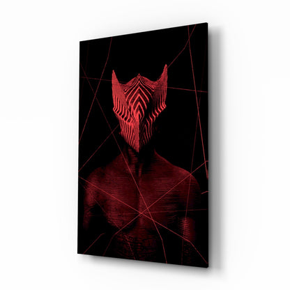 Angled 3/4 view of dark glass wall art with red neon-style geometric face and linear patterns against black background.