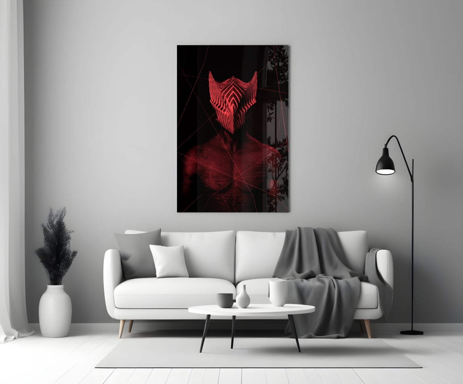 Red neon glowing face artwork hanging above white sofa in minimalist living room setting.