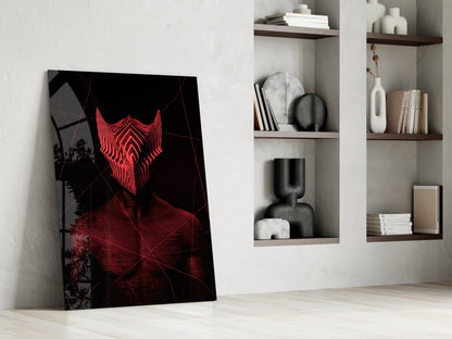 Darko Red Glass Wall Art leaning against white wall beside built-in shelving displaying decorative objects and books.