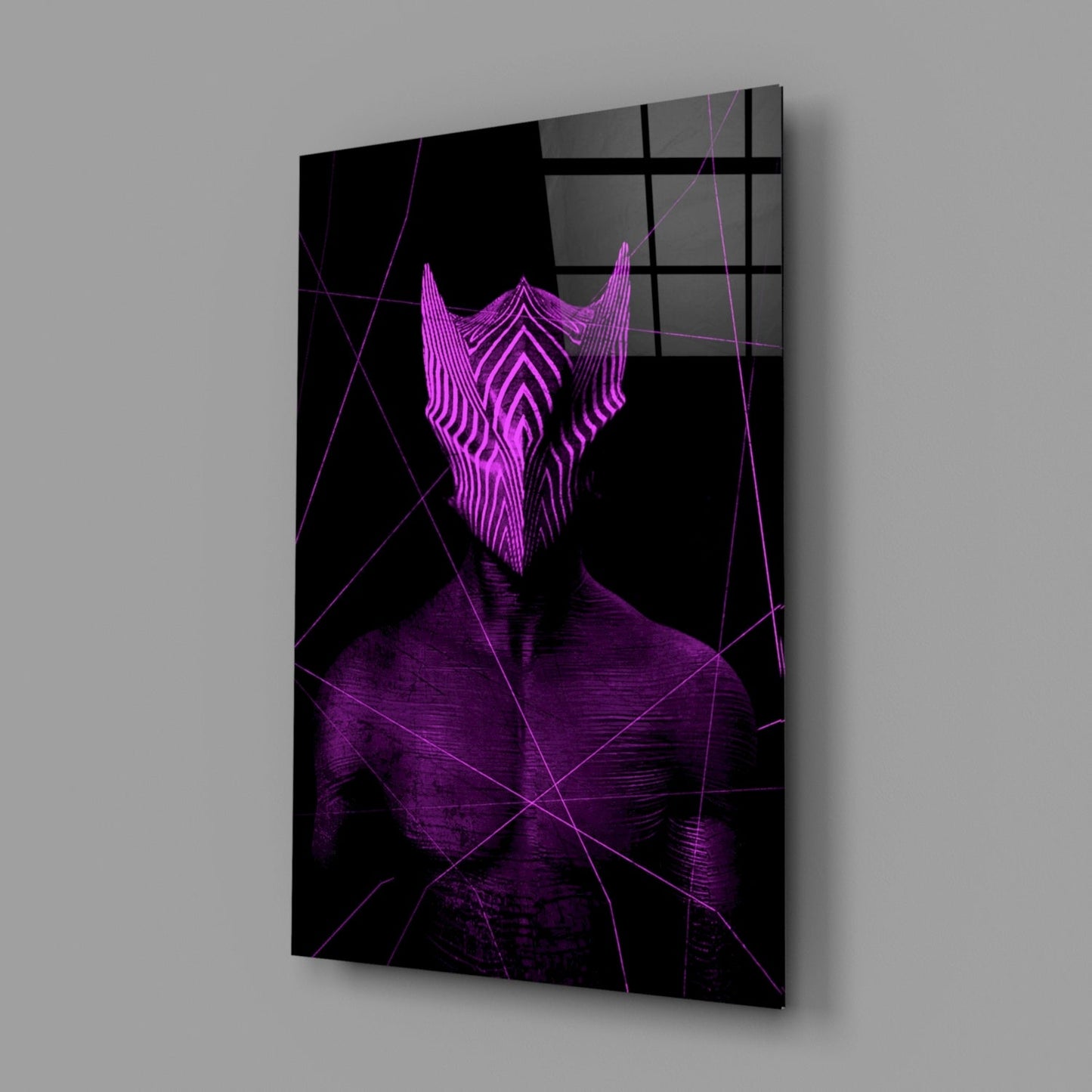 Angled perspective of glass wall art displaying a neon purple glowing mask and geometric lines on black background.