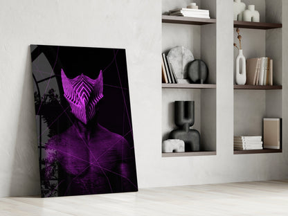 Darko Violet Glass Wall Art leans against white wall beside shelving unit, displaying neon purple geometric mask design on black background.