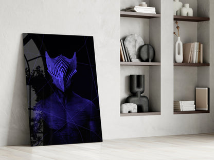 Darko Purple Glass Wall Art leaning against white wall beside shelving unit, displaying blue neon mask design on black background.