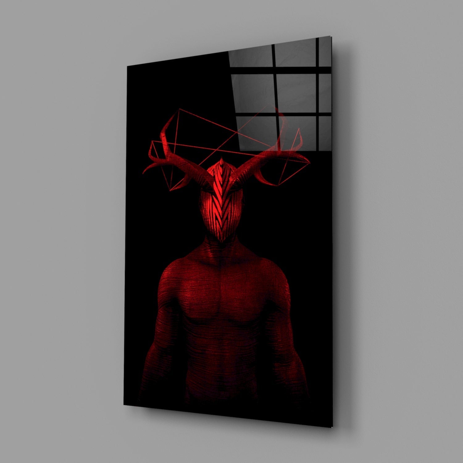Red neon demonic figure with geometric head displayed on black glass panel, angled three-quarter view showing wall mounting.