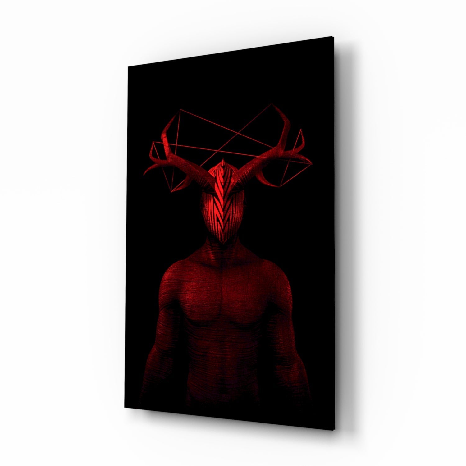 Red glowing demonic figure with antlers and geometric head design displayed on black glass panel at an angle.
