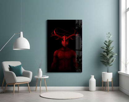 Red glowing horned demon figure displayed on black canvas mounted on pale blue wall above white chair and plants.
