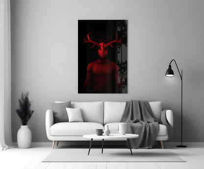 Red glowing neon glass wall art depicting a horned figure displayed above a white sofa in a minimalist living room.
