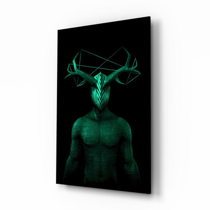 Three-dimensional angled view of green glass wall art depicting a muscular humanoid figure with geometric antler head against black background.