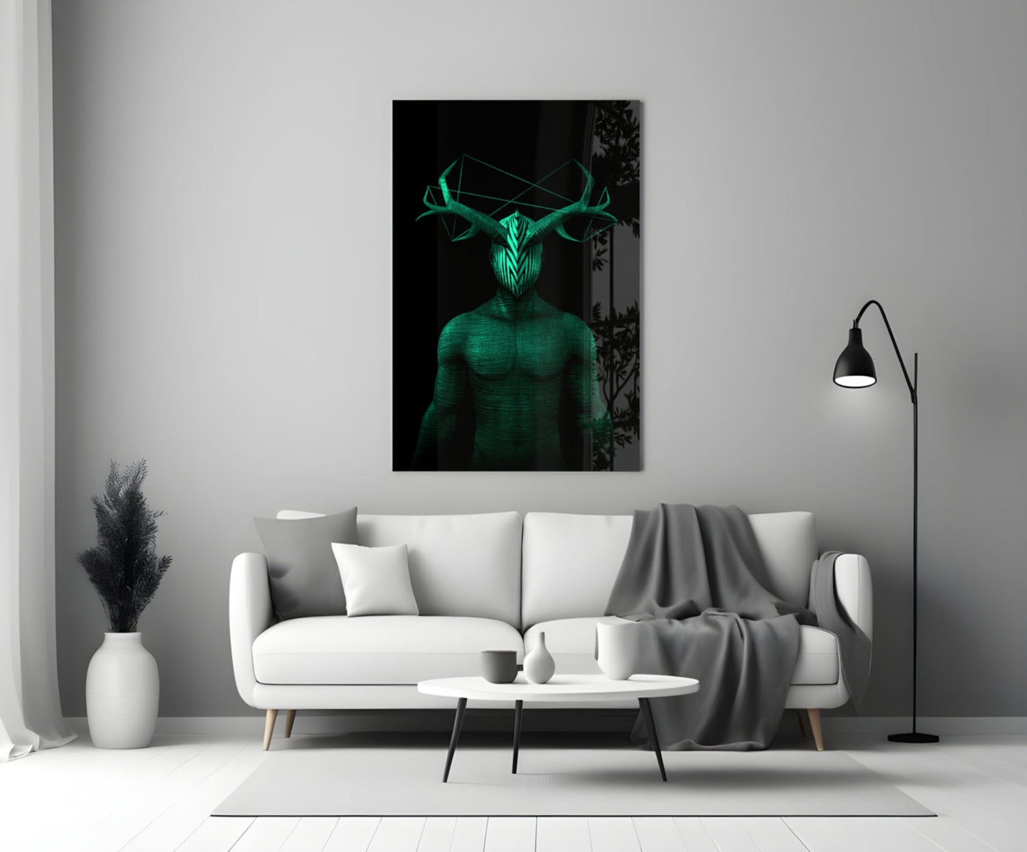 Glowing green glass wall art depicting a humanoid figure with antlers displayed above a white sofa in a modern living room setting.