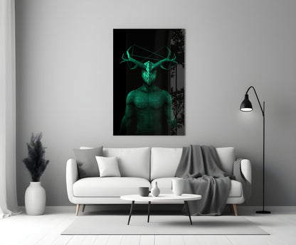 Glowing green glass wall art depicting a humanoid figure with antlers displayed above a white sofa in a modern living room setting.