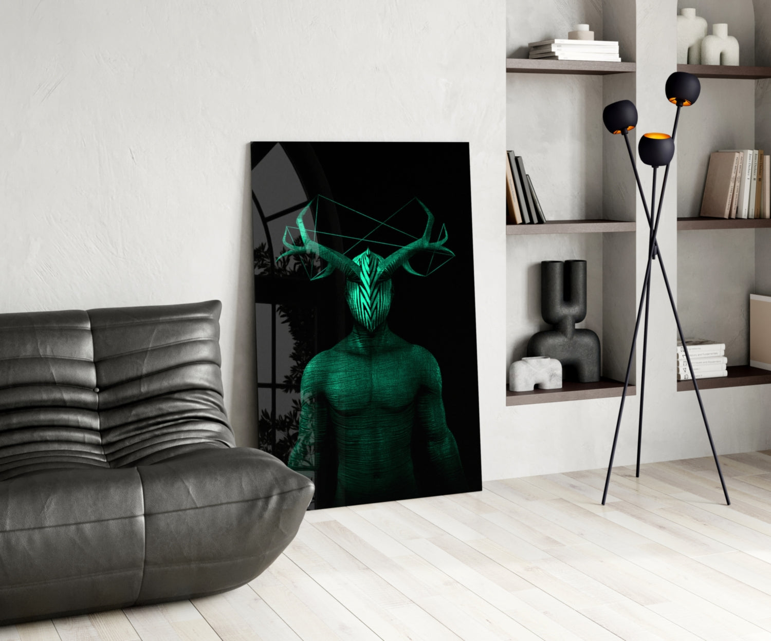 Contemporary living room featuring Donnie Green Glass Wall Art leaning against white wall beside gray leather chair and black floor lamp.