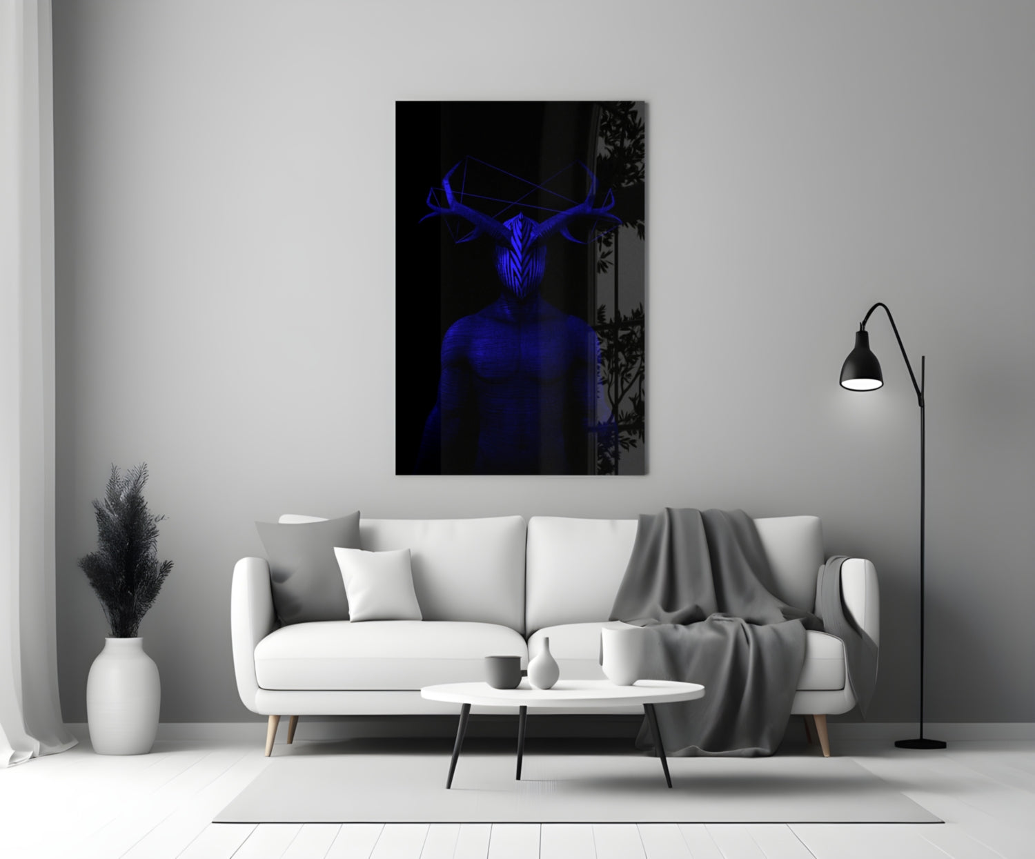 Blue glowing figure with antlers displayed on black glass panel above white sofa in minimalist living room setting.