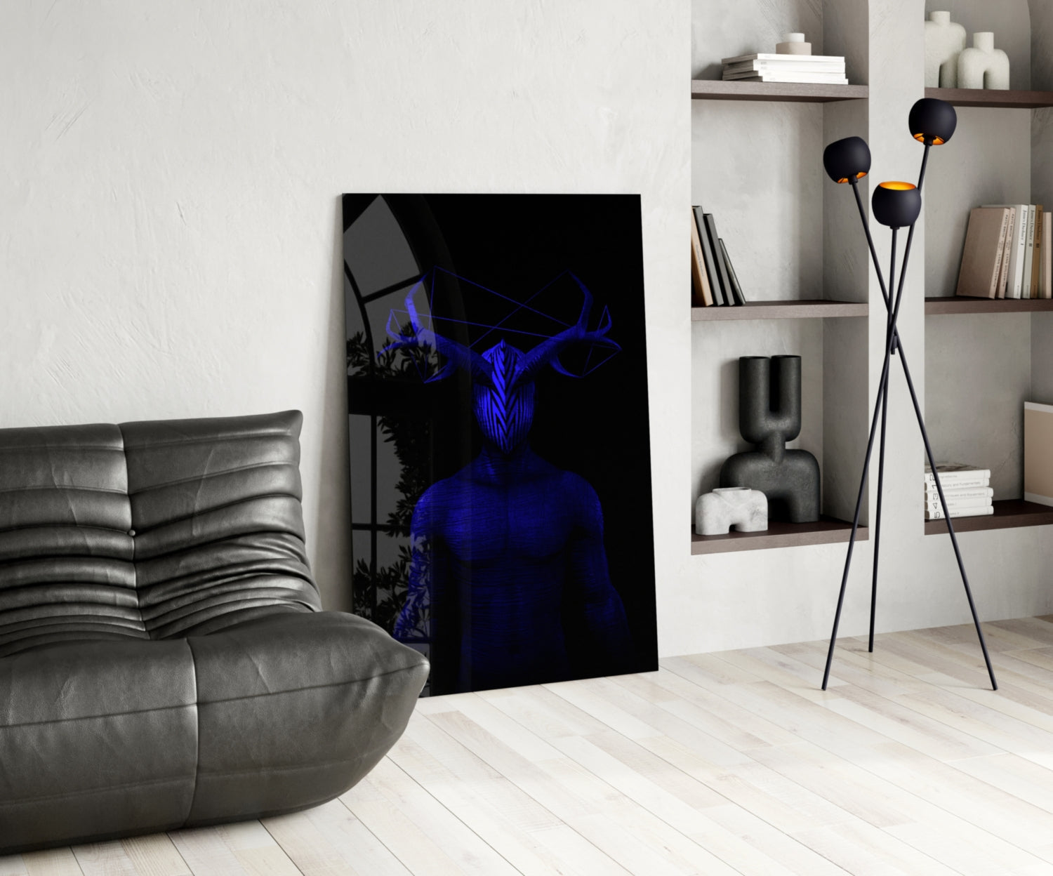 Modern living room interior displaying Donnie Blue Glass Wall Art leaning against white wall, featuring blue neon figure with horns on black background.