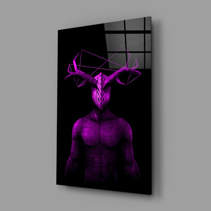 Angled view of purple neon glass wall art depicting a muscular humanoid figure with deer antlers against black background, mounted on gray wall.