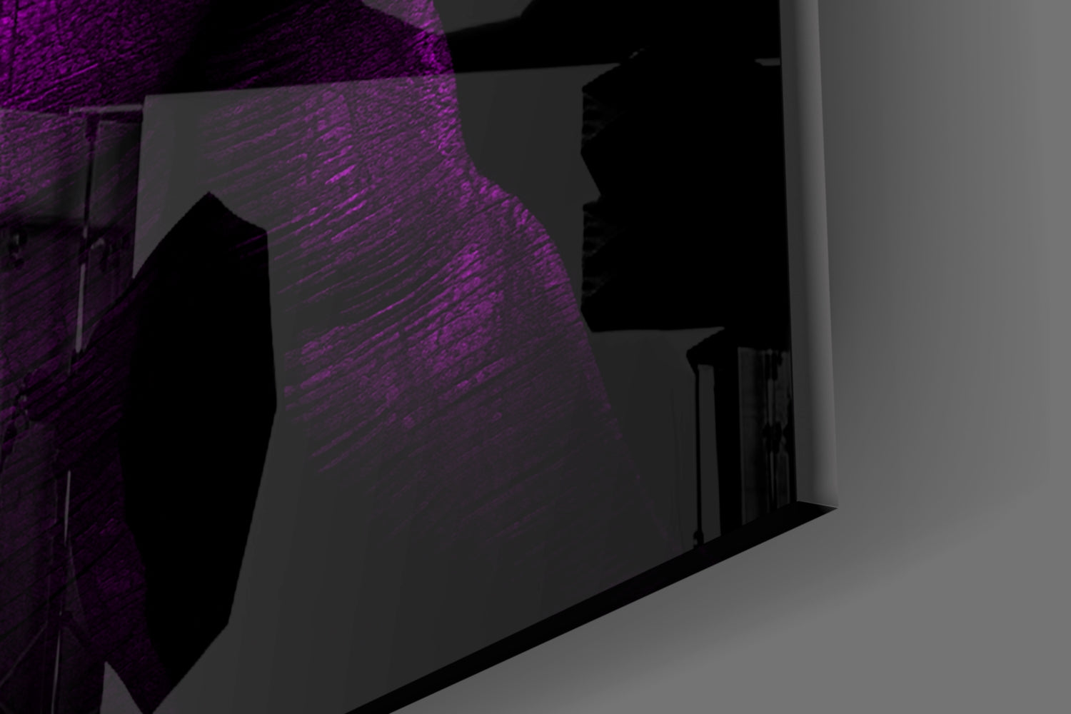 Purple illuminated glass wall art panel mounted in corner alcove with textured brick surface and dramatic side lighting.