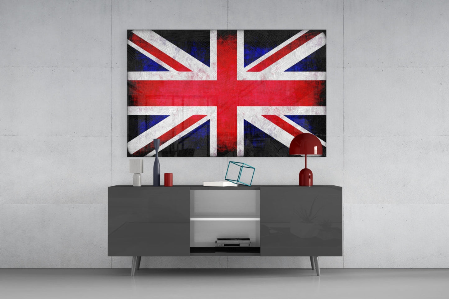 British Flag Glass Wall Art mounted above a dark gray media console with decorative accessories in a modern living room setting.