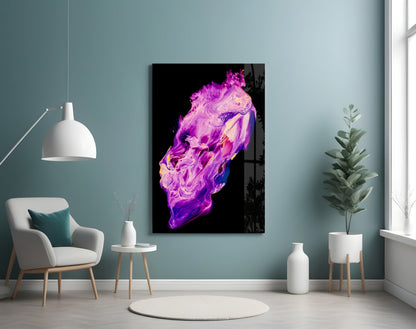 Abstract purple and magenta glass wall art with gold accents displayed in a modern room setting with teal walls and furnishings.