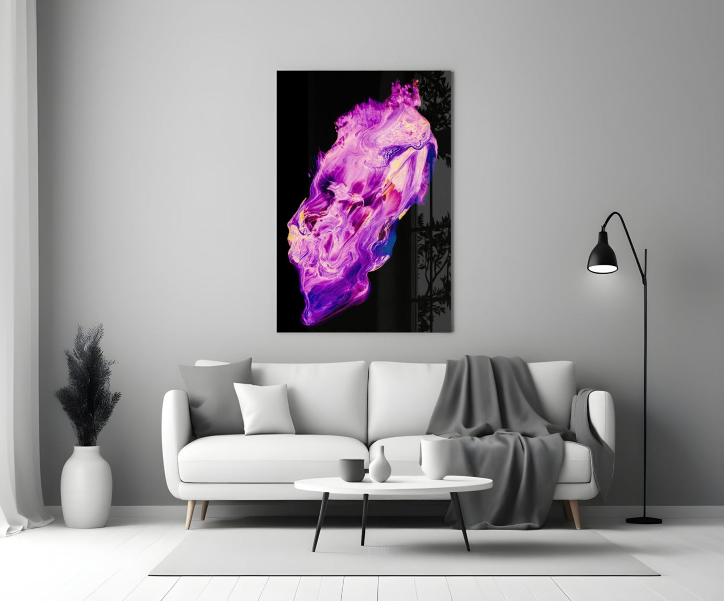Abstract purple and magenta glass wall art with fluid swirled patterns displayed above a white sofa in a modern living room.