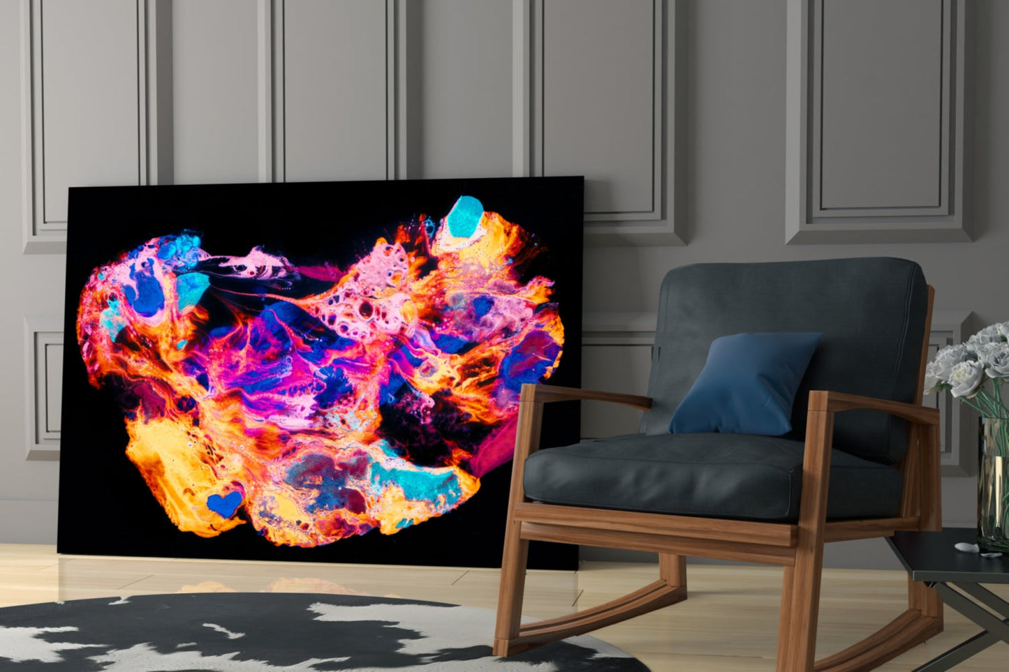 Vibrant abstract glass wall art displaying a colorful map of China in fiery oranges, blues, pinks, and yellows against black background, displayed in modern living room setting beside wooden rocking chair.