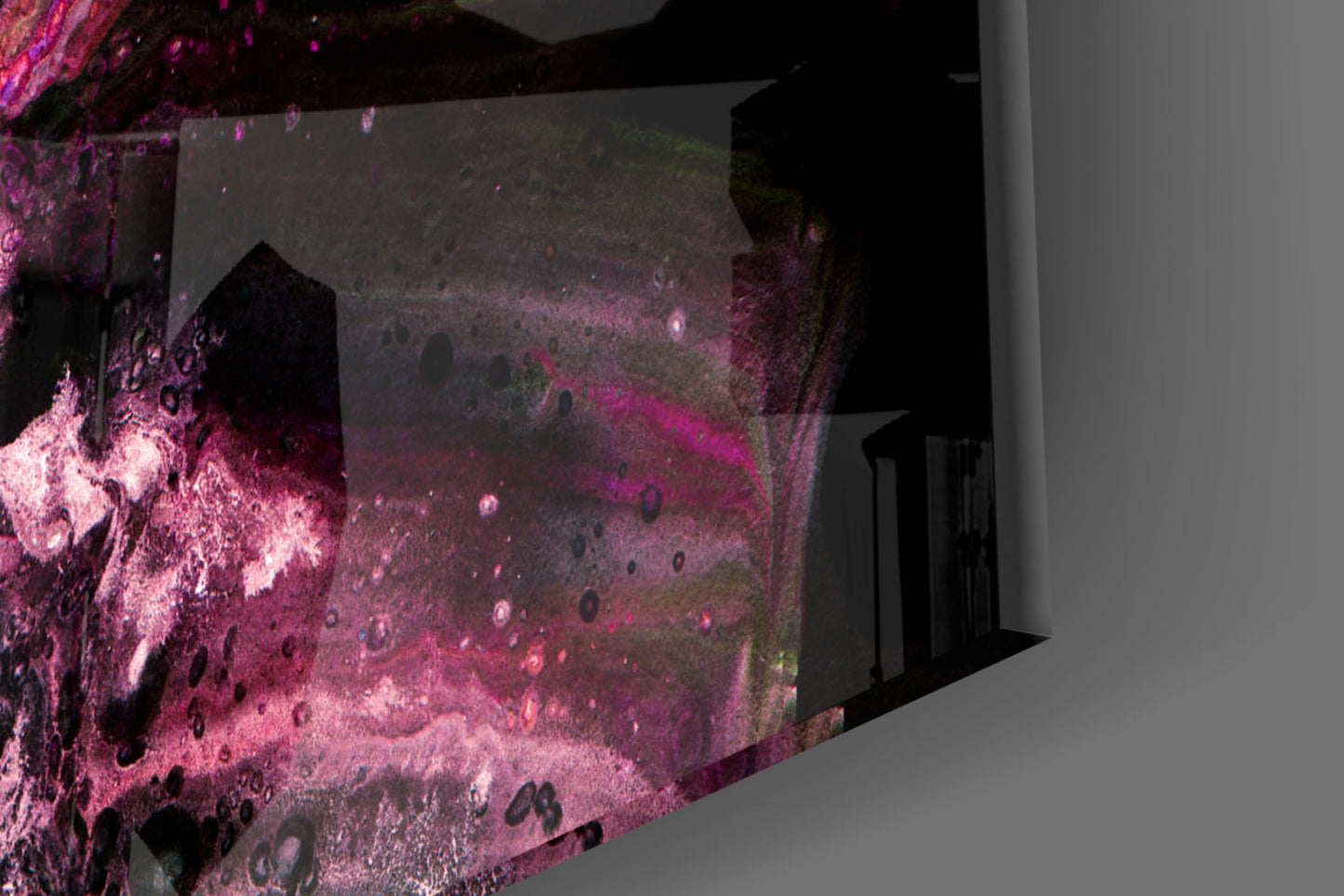 Purple Space Glass Wall Art installed on white wall, showing cosmic design with pink and magenta nebula effects and dark crater details.