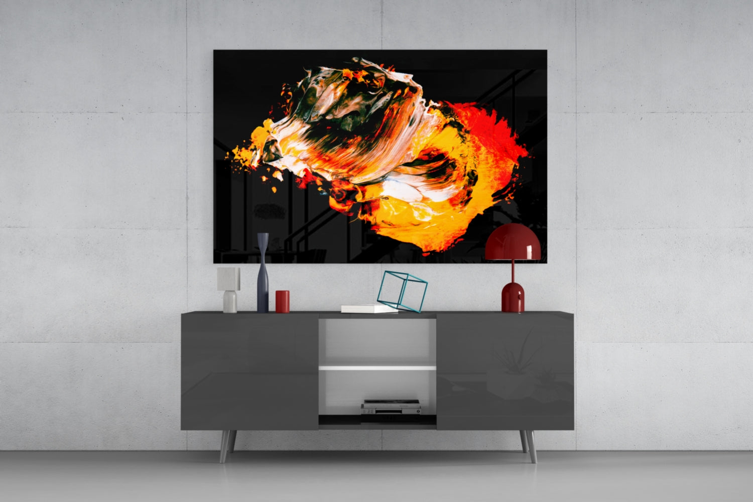 Modern living room setup with flat-screen TV displaying abstract orange and yellow brushstroke artwork above dark gray media console.