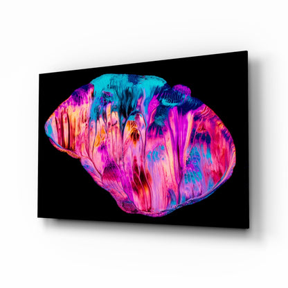 Vibrant abstract glass wall art featuring swirling pink, magenta, cyan, and orange patterns against black background, displayed at angled perspective.
