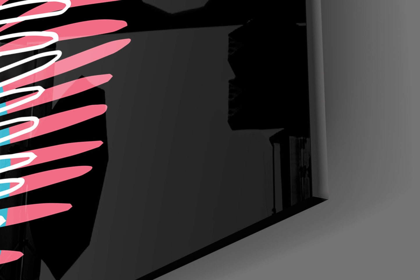 Pink and black glass fern wall art displayed in an interior space with architectural shadows and doorway visible.