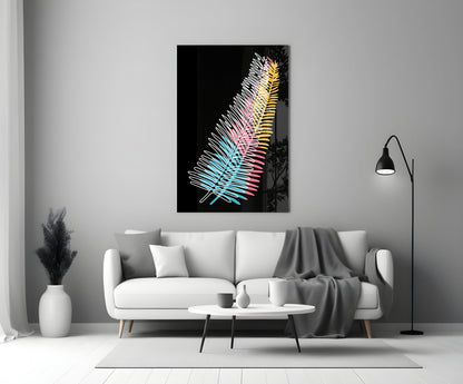 Colorful fern glass wall art with neon blue, pink, and yellow gradient displayed above white sofa in modern living room.