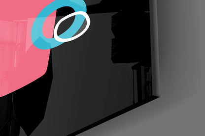 Modern interior space featuring pink and black wall with blue and white circular logo design displayed prominently.
